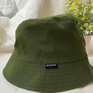 Noxin brand reversible bucket hat.  Army green, yellow, brown & blue colors